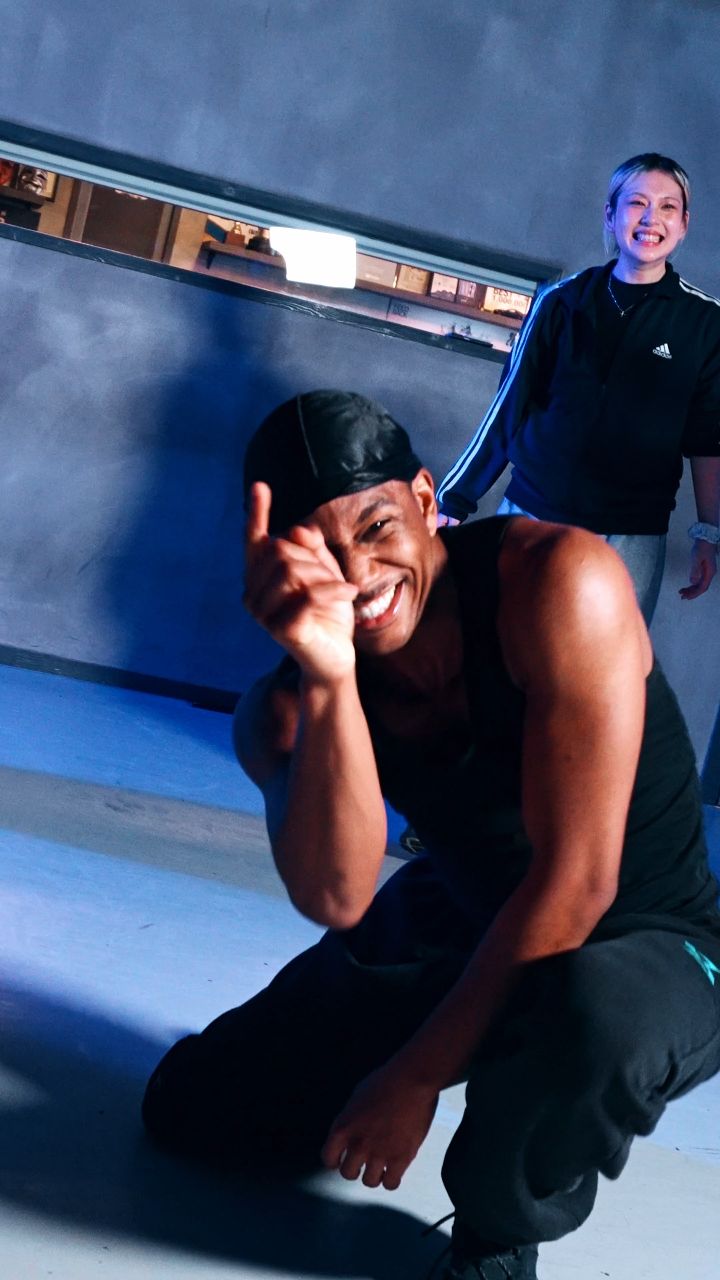 Anthony King smiling during a dance studio session